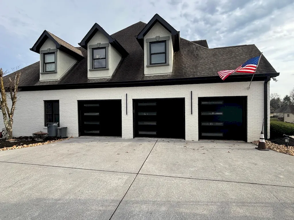 Residential garage doors at a home exterior in Pigeon Forge TN